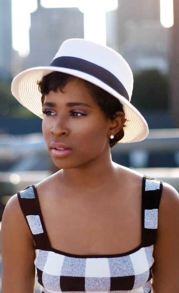 The Measurement of Dej Loaf's Height and Body