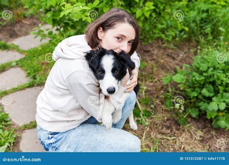 A woman's heartfelt desire fulfilled: embracing an adorable canine companion