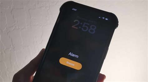 Can the iPhone alarm wake you up if the device is powered down?