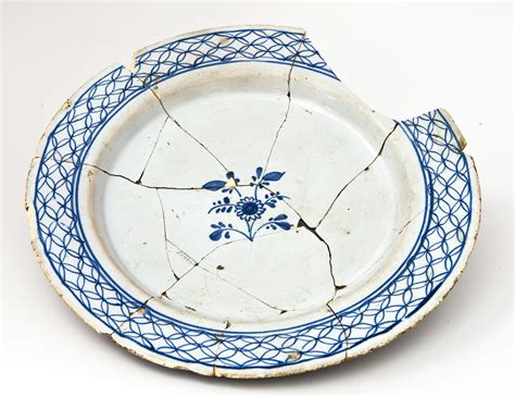 Discover the Symbolic Meaning of Shattered Dinnerware in Dreams