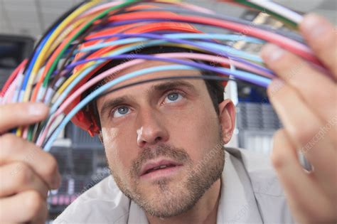 Examining the cable design and build quality for signs of authenticity