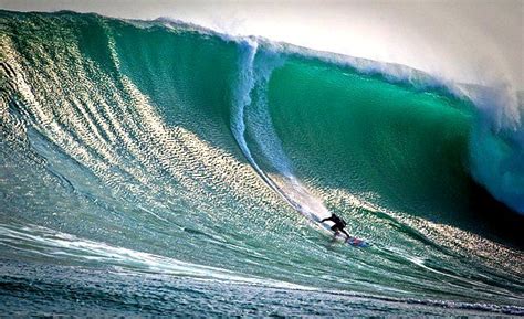 Exhilarating Big Wave Surfing: An Adventurous Quest That Pushes Human Limits