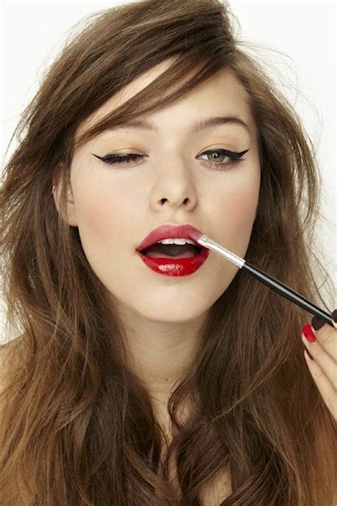 Exploring the Psychological Meanings Behind the Act of Applying Bold Red Lipstick