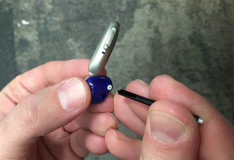 Removing Accumulated Debris from the Earpiece