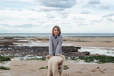 The Bonding Journey of a Young Lad and His Canine Companion