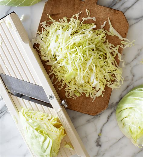 The Essence of Fresh Cabbage Cutting: A Multifaceted Exploration