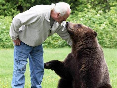 The Extraordinary Bond: A Young Bear and a Human