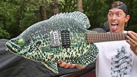 The Man's Struggle to Master His New Fish Guitar