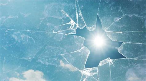 The Symbolic Significance of a Shattered Reflection in a Lady's Vision