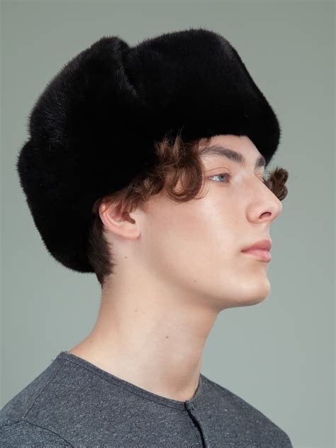 Unveiling the Symbolism Behind a Gentleman Donning an Ushanka Cap in Dream Imagery