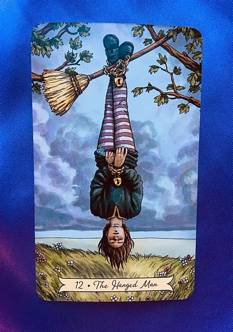 Unveiling the Symbolism of a Hanging Tarot Card